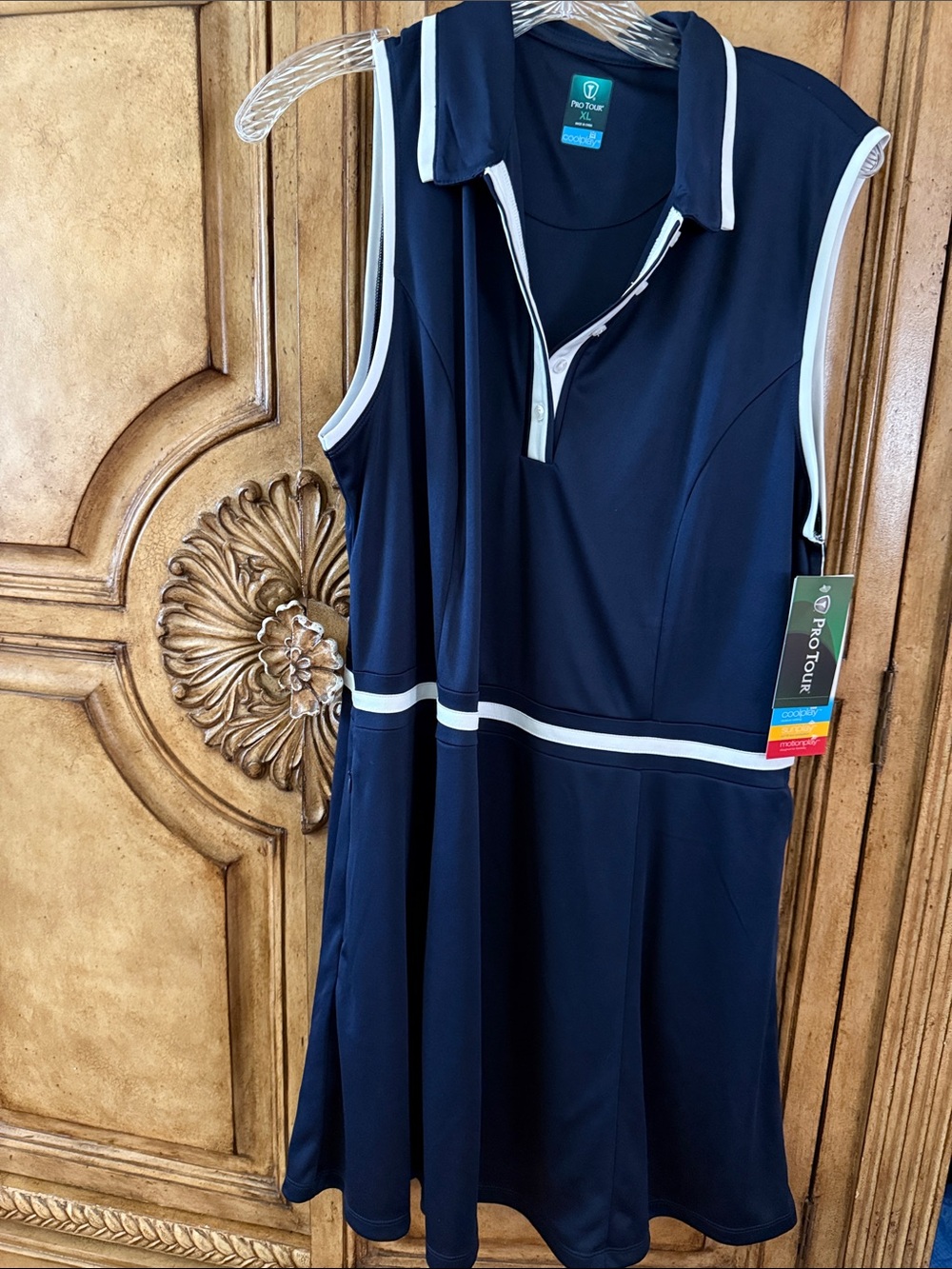 Pro Tour Navy Sleeveless Polo Dress with White Trim